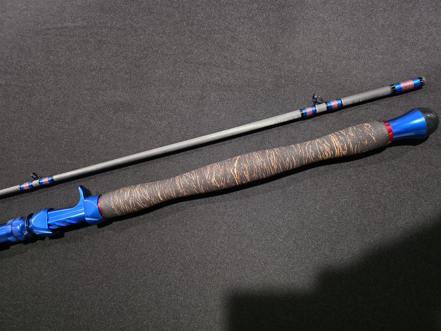 Custom blue and natural-grip Recon Rods detail
